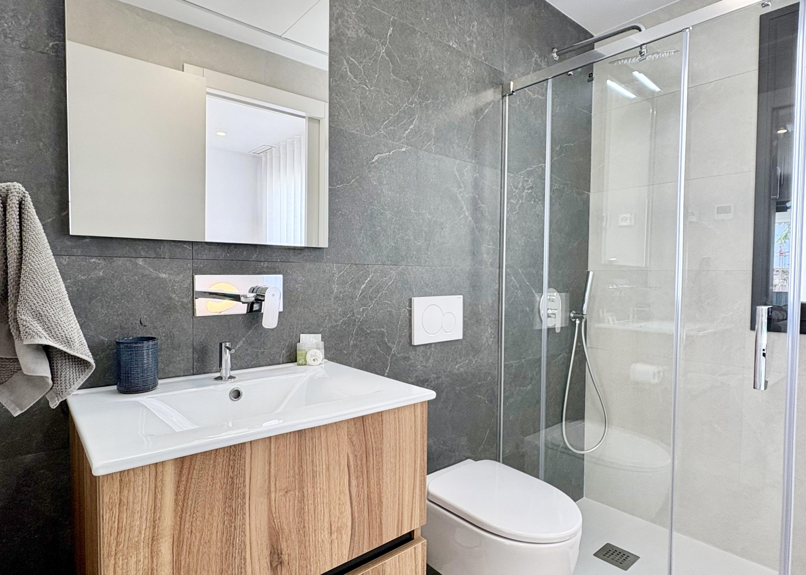 Modern bathroom in Villa Almendro at Santa Rosalía Lake & Life Resort by Levante Properties