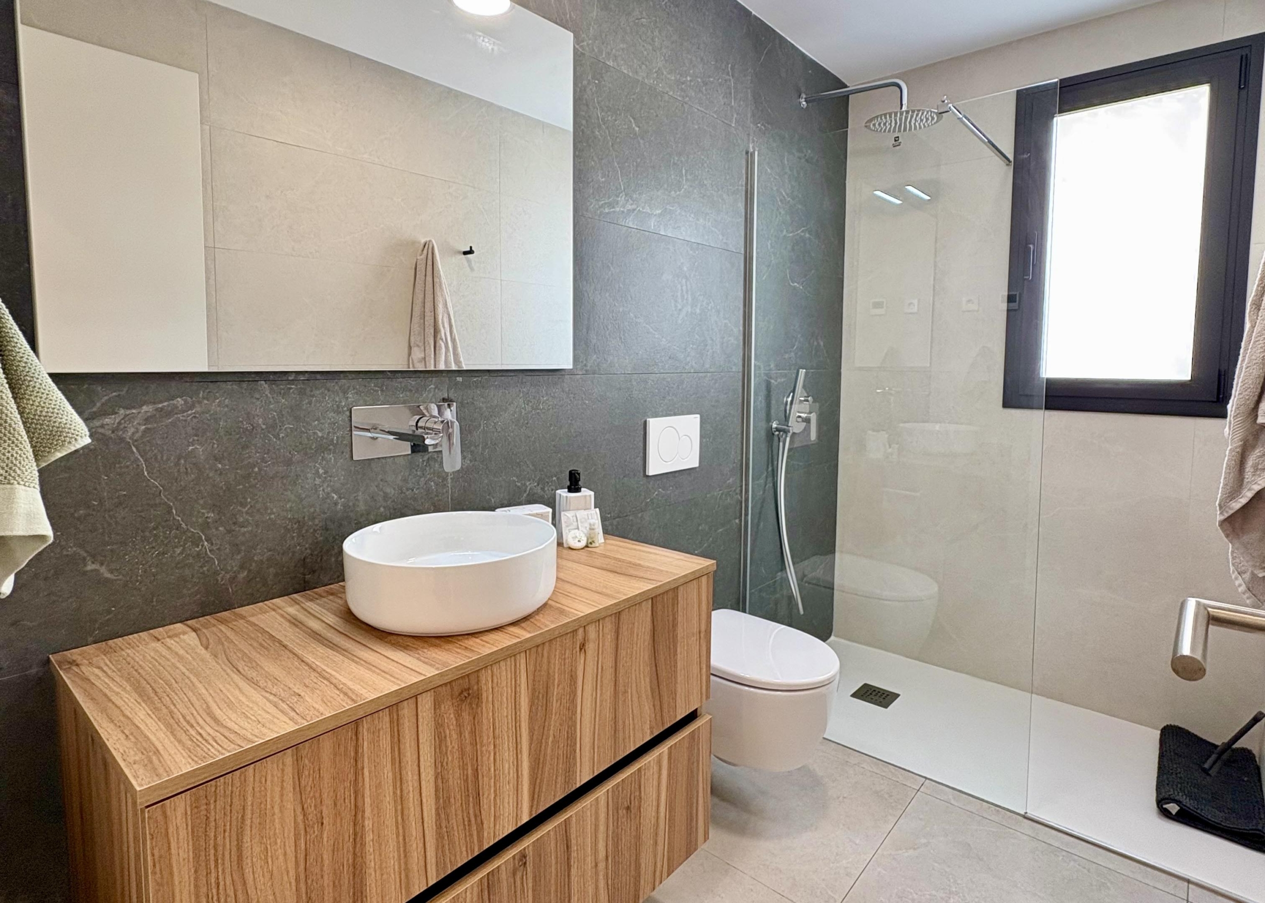 Modern bathroom in Villa Almendro at Santa Rosalía Lake & Life Resort by Levante Properties