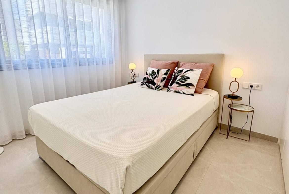 Modern bedroom in Villa Almendro at Santa Rosalía Lake & Life Resort by Levante Properties