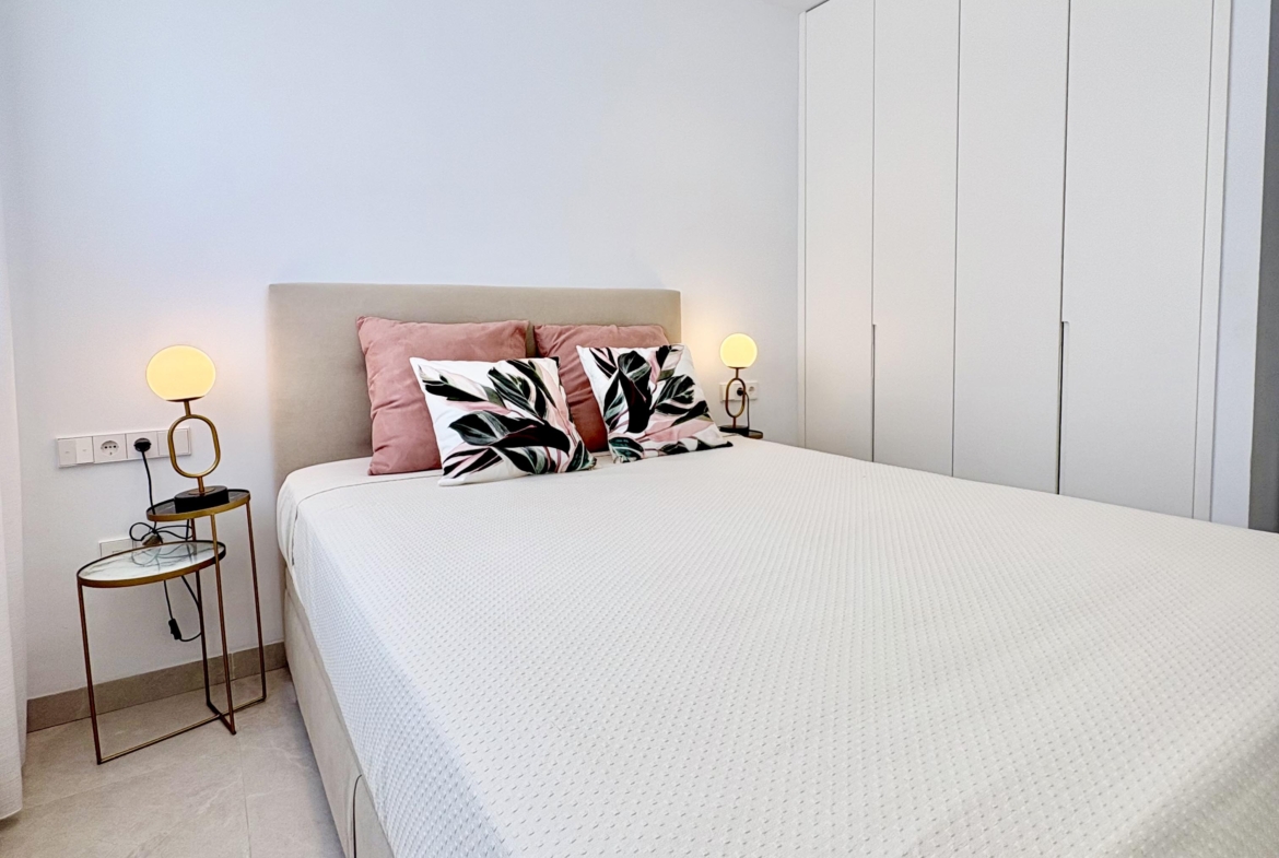 Modern bedroom in Villa Almendro at Santa Rosalía Lake & Life Resort by Levante Properties