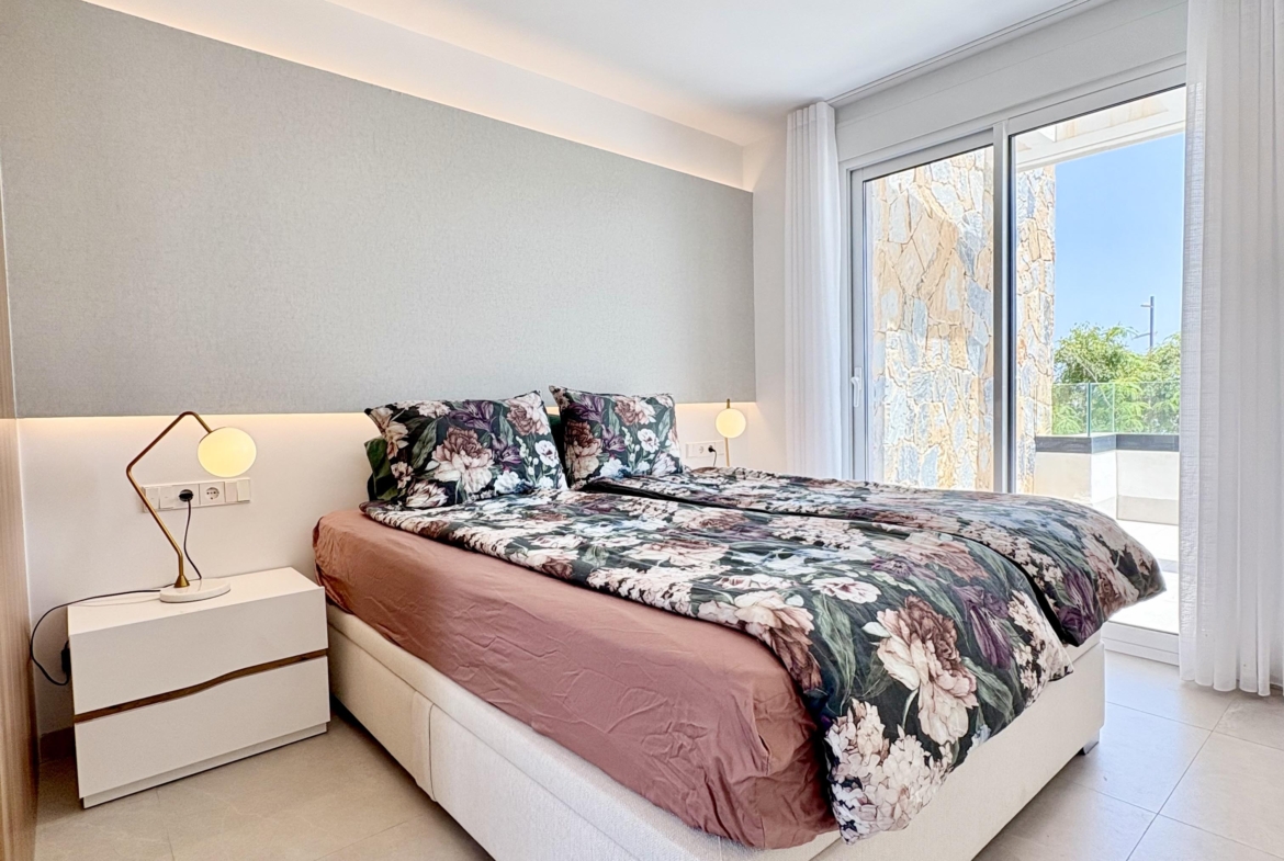 Modern bedroom in Villa Almendro at Santa Rosalía Lake & Life Resort by Levante Properties