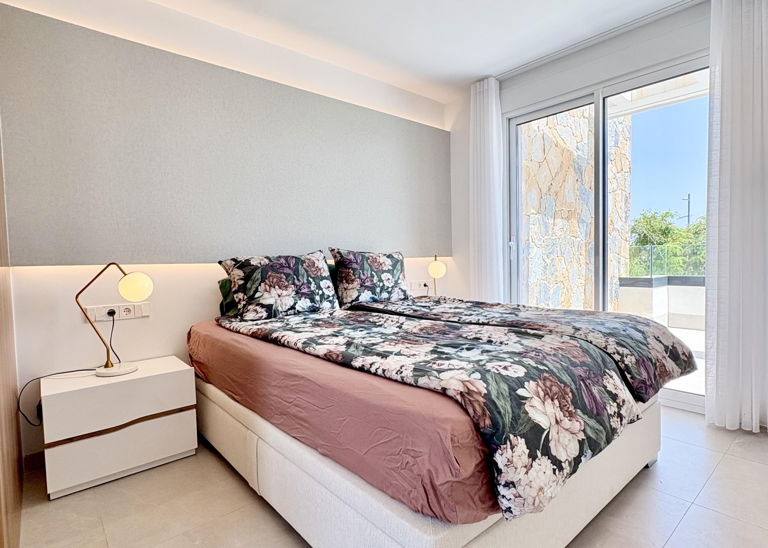 Modern bedroom in Villa Almendro at Santa Rosalía Lake & Life Resort by Levante Properties