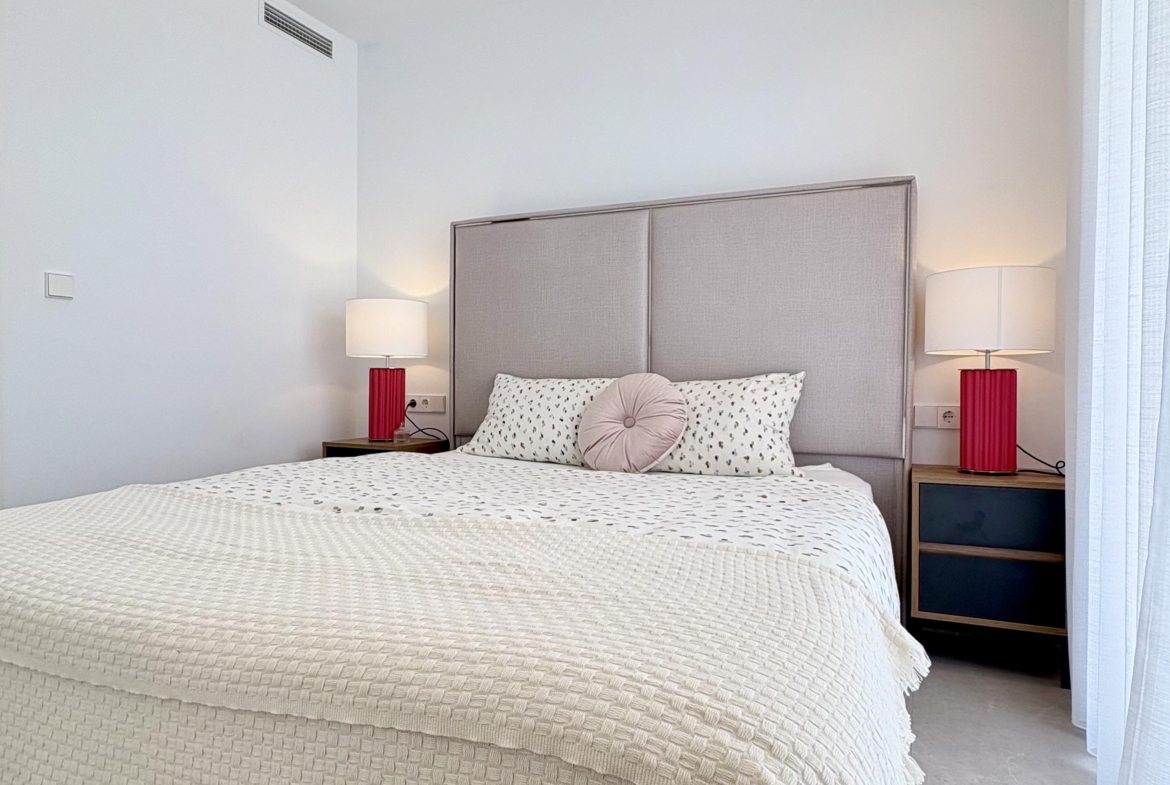 Modern bedroom in Villa Almendro at Santa Rosalía Lake & Life Resort by Levante Properties
