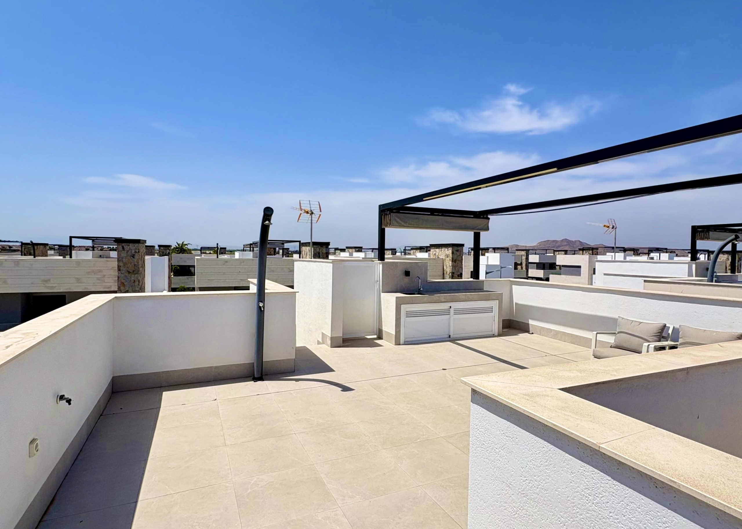 Rooftop solarium with outdoor kitchen at Villa Almendro Santa Rosalía