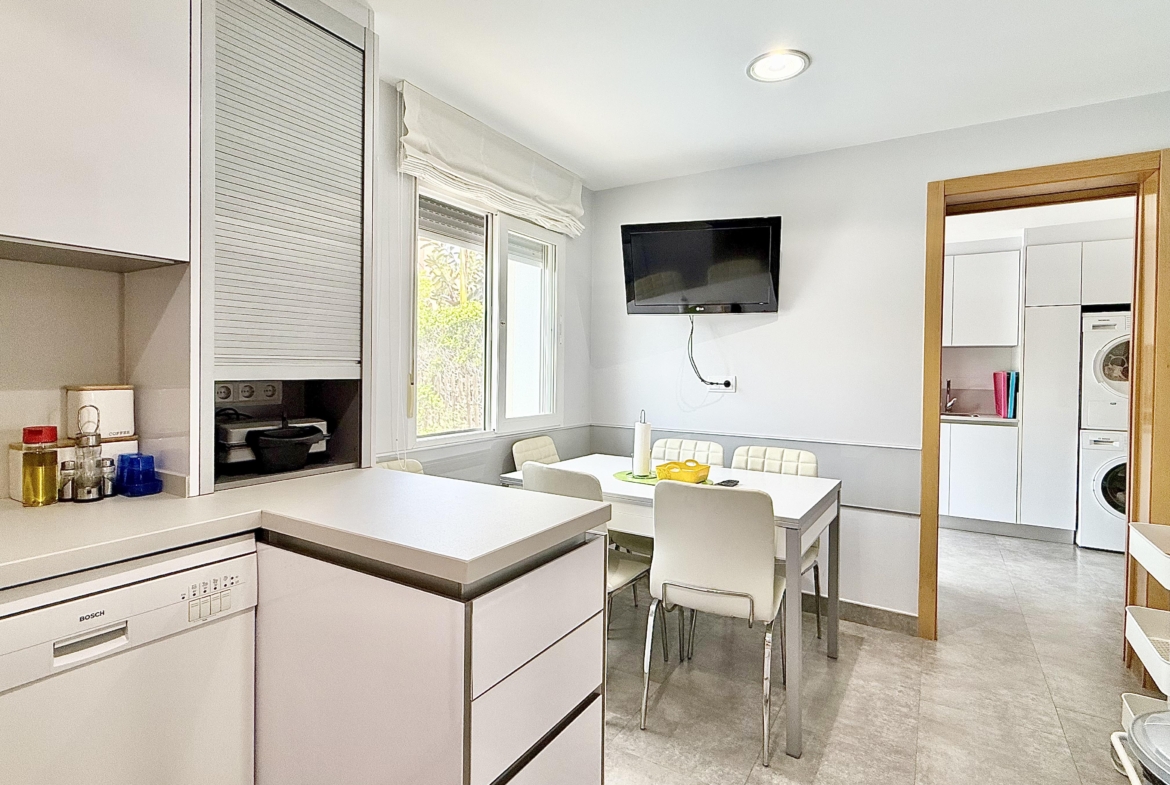 Modern extended kitchen with laundry area in a Levante Properties villa at Mar Menor Golf Resort.