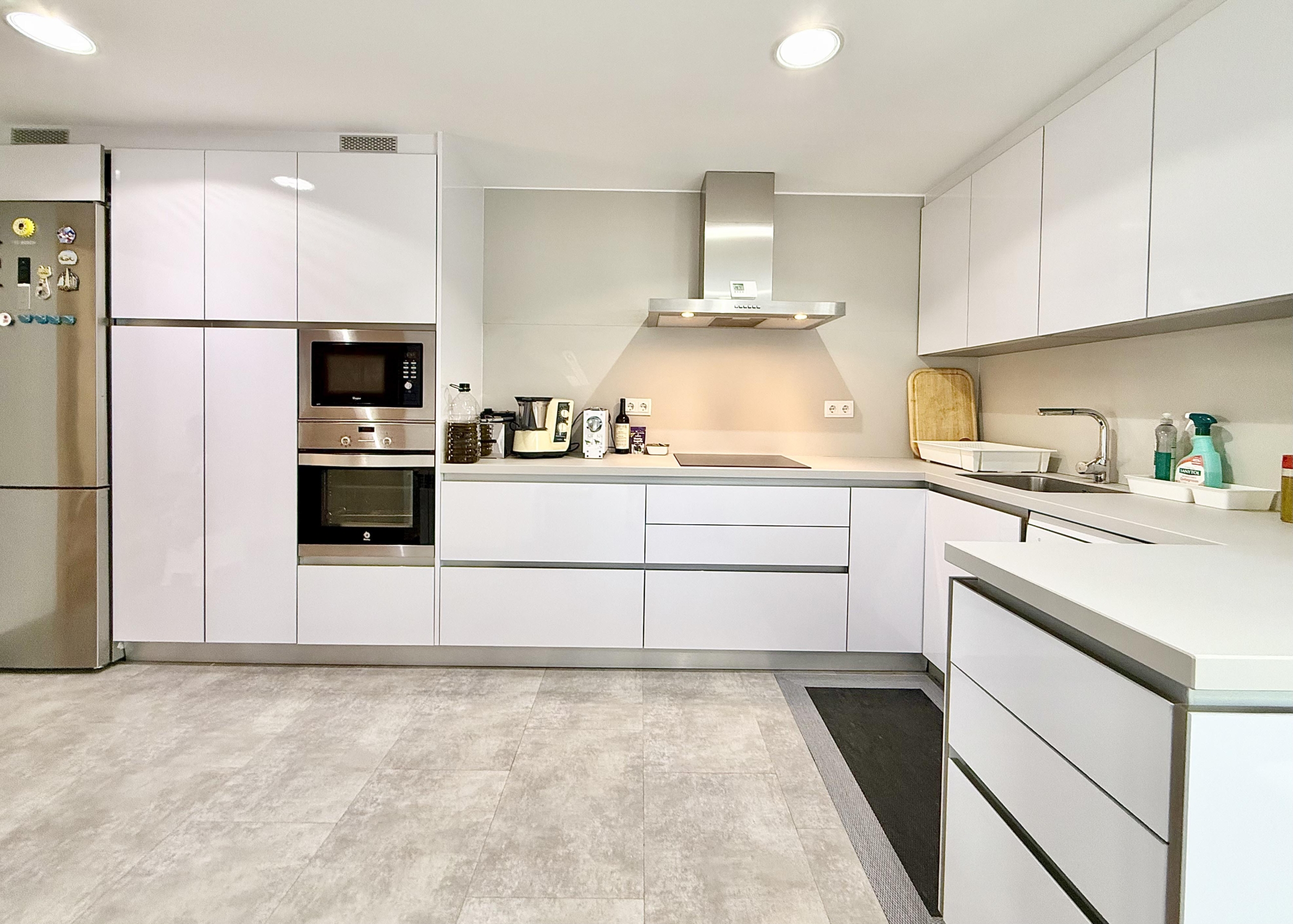 Modern extended kitchen with laundry area in a Levante Properties villa at Mar Menor Golf Resort.