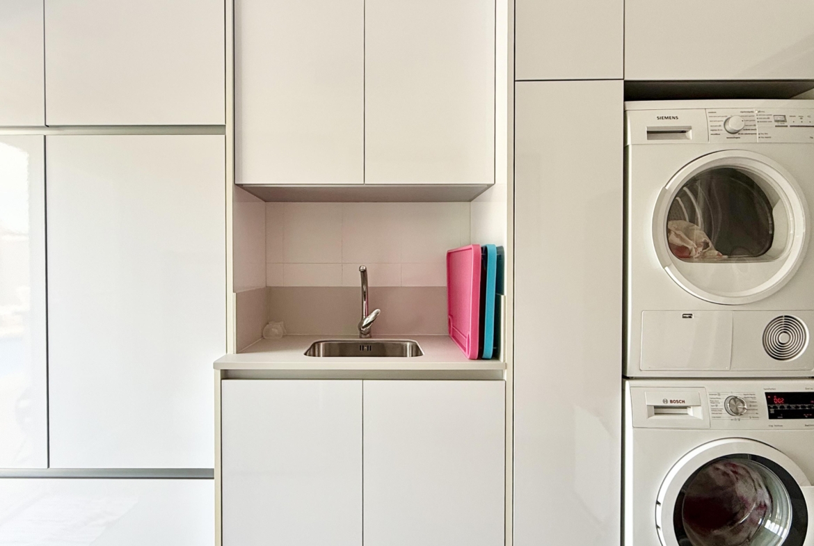 Modern extended kitchen with laundry area in a Levante Properties villa at Mar Menor Golf Resort.