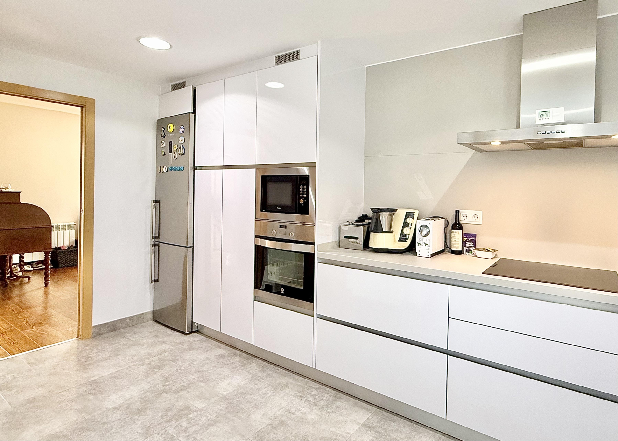 Modern extended kitchen with laundry area in a Levante Properties villa at Mar Menor Golf Resort.