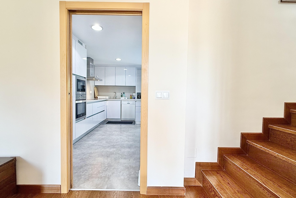 Modern extended kitchen with laundry area in a Levante Properties villa at Mar Menor Golf Resort.