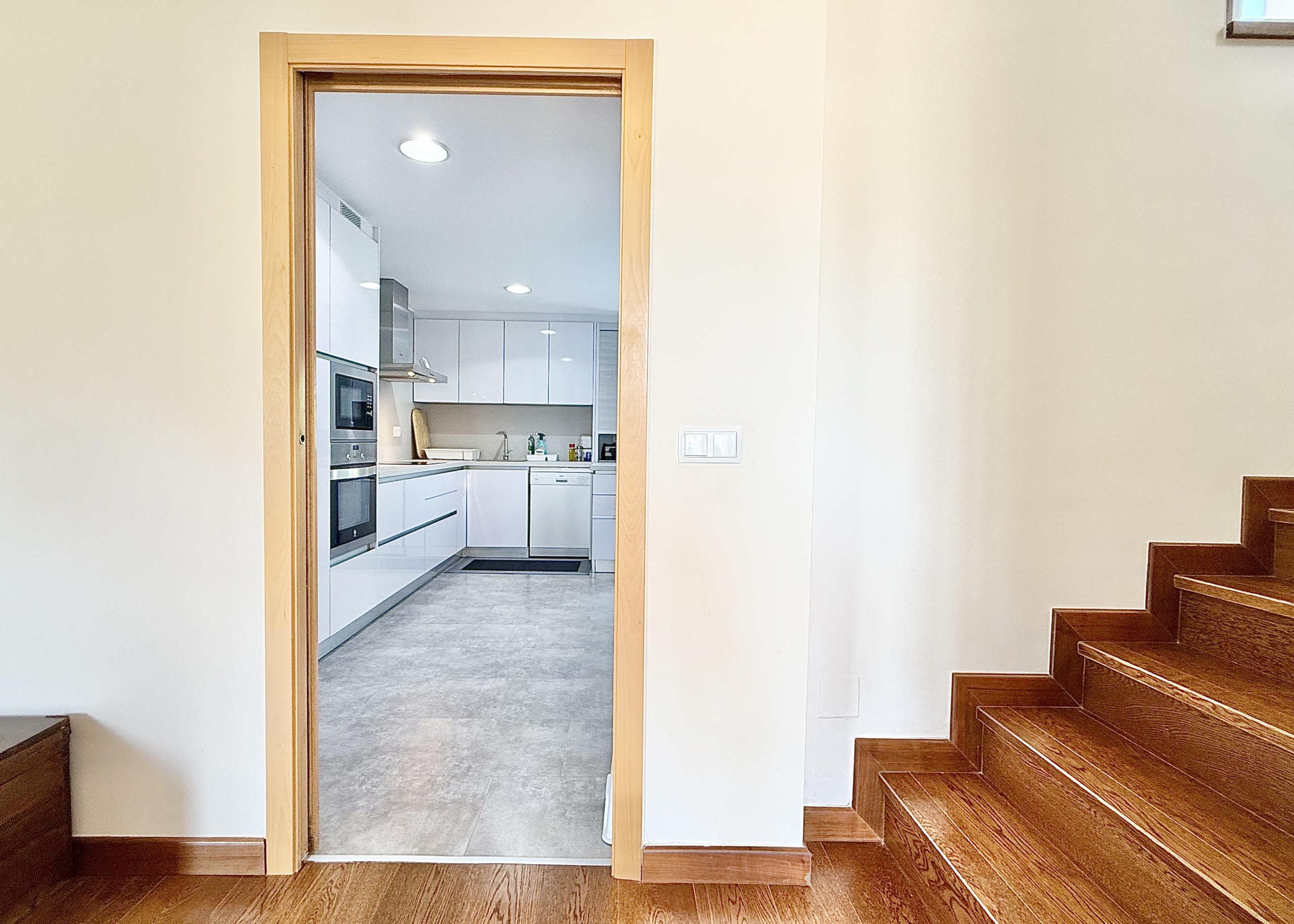 Modern extended kitchen with laundry area in a Levante Properties villa at Mar Menor Golf Resort.