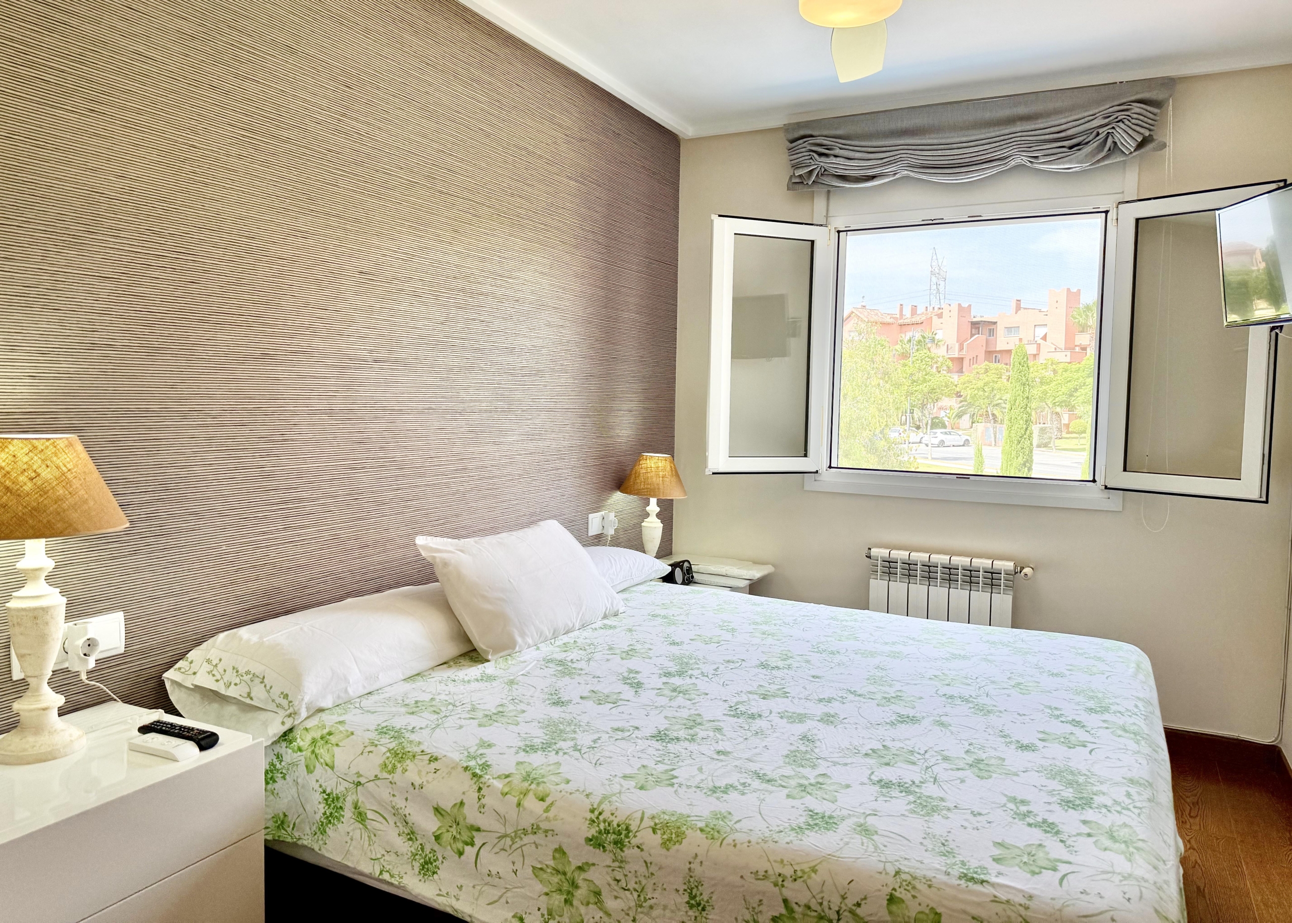 Double bedrooms with fitted wardrobes in a Levante Properties villa at Mar Menor Golf Resort.