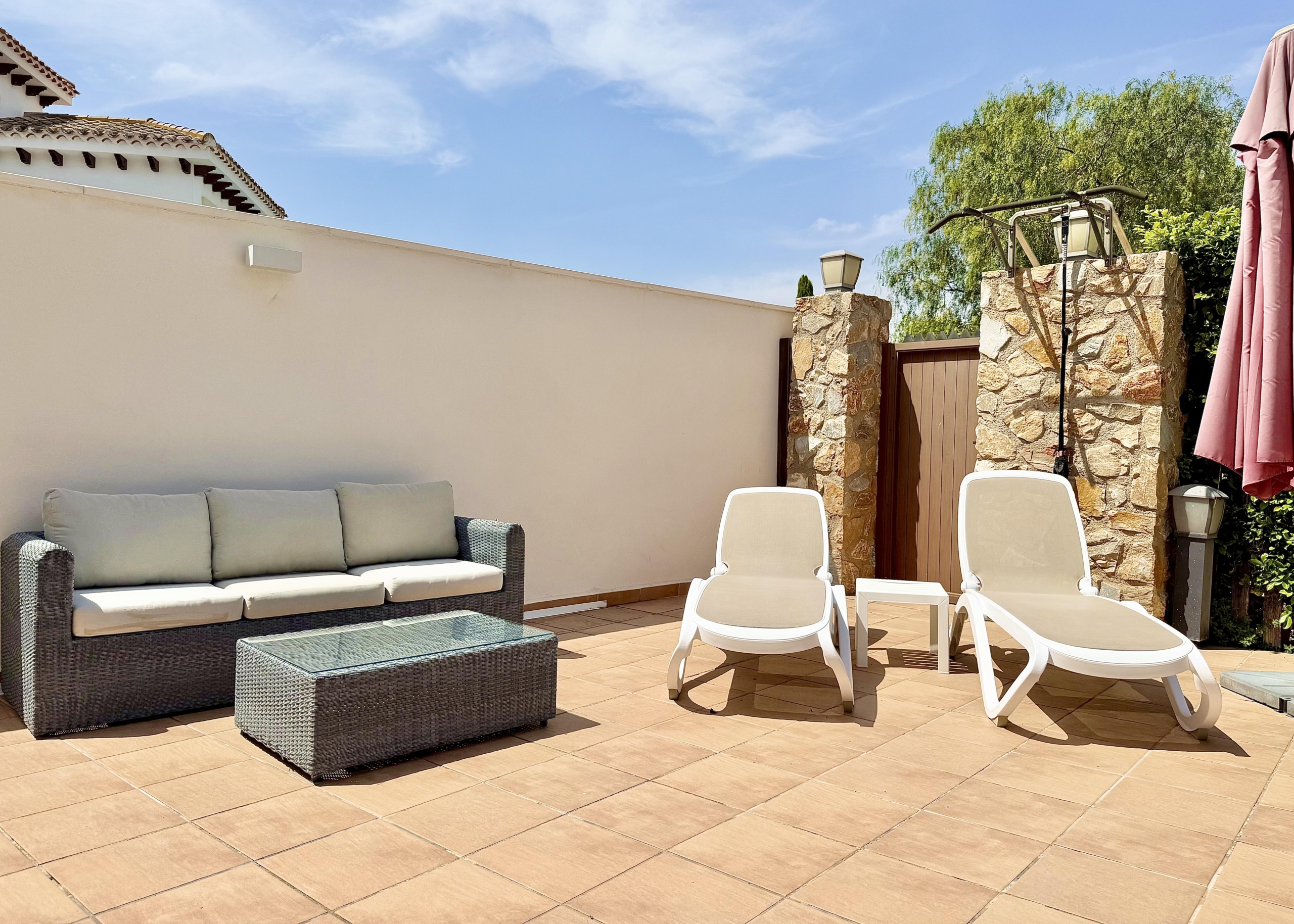 West-facing private swimming pool and garden of the Baron villa in Mar Menor.