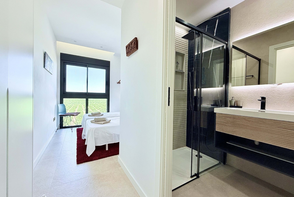 Contemporary bathroom in Mirador apartment with walk-in shower
