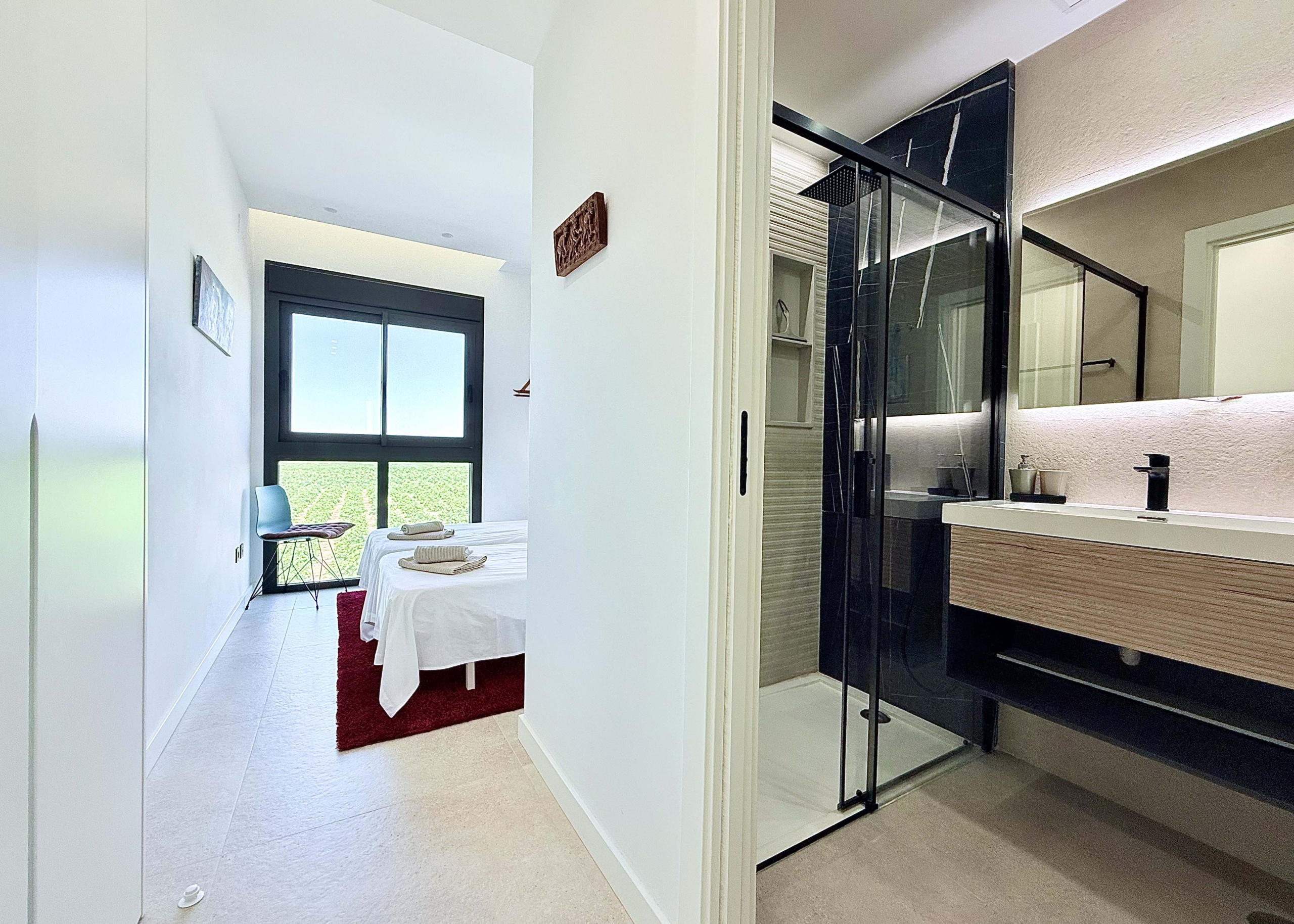 Contemporary bathroom in Mirador apartment with walk-in shower