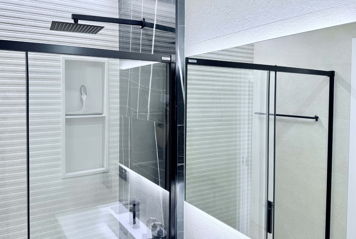 Contemporary bathroom in Mirador apartment with walk-in shower