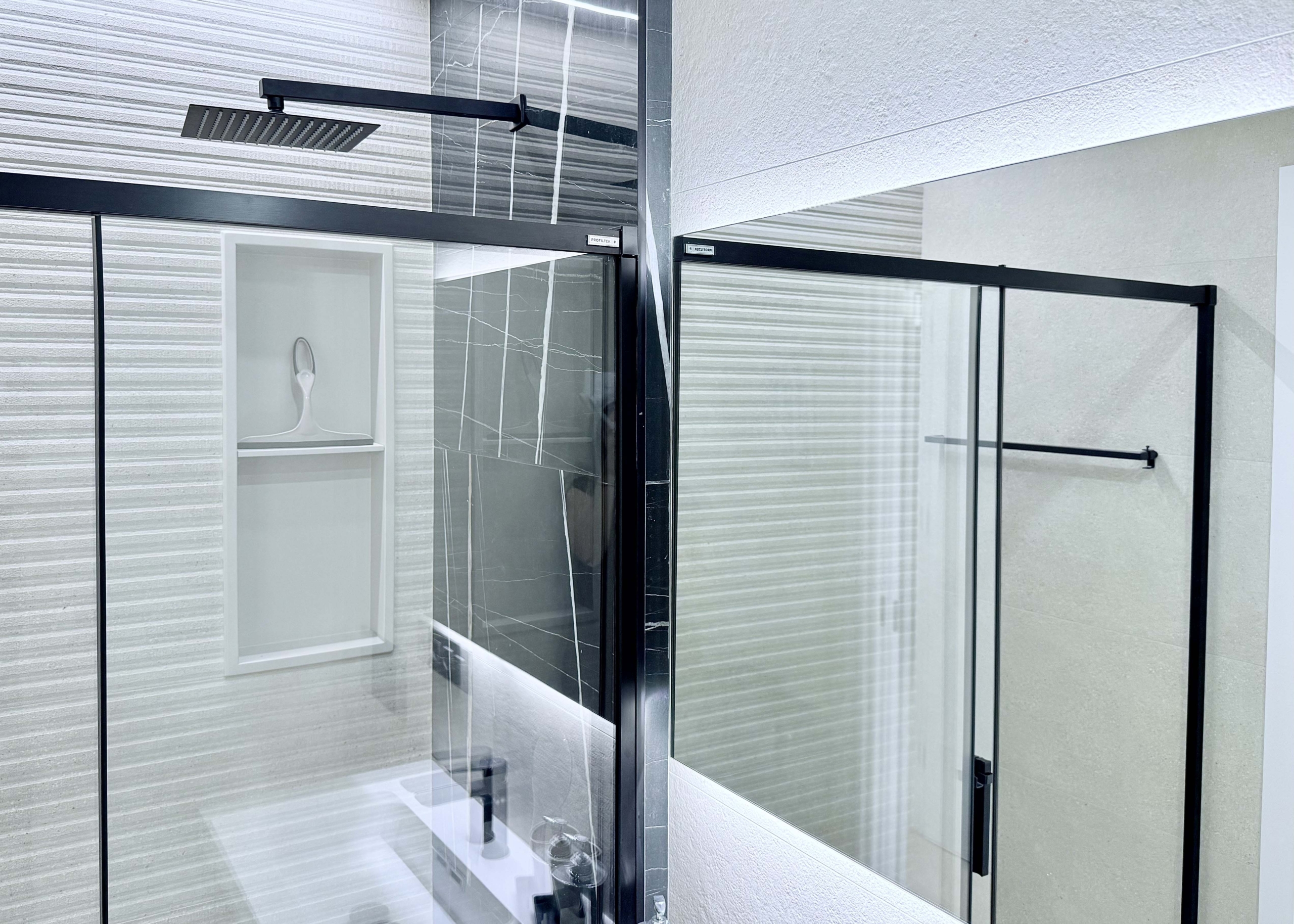 Contemporary bathroom in Mirador apartment with walk-in shower