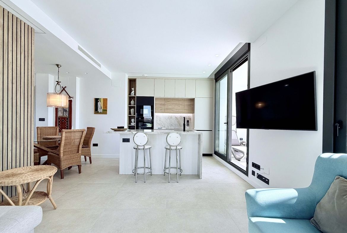 Modern kitchen with island in Mirador apartment