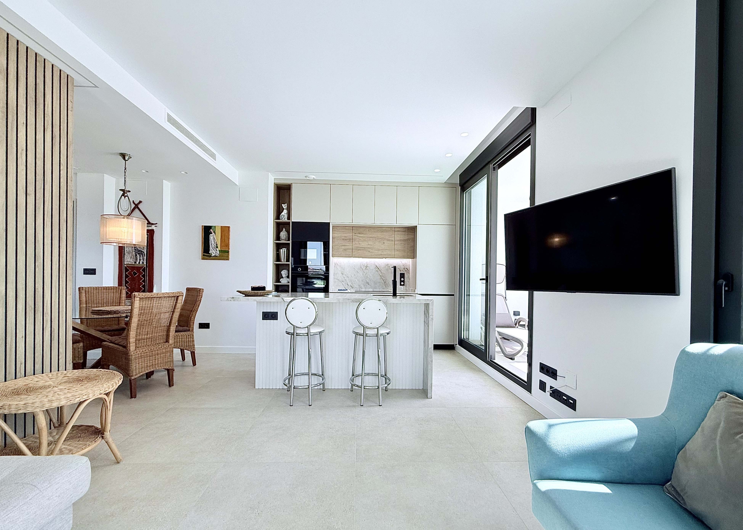 Modern kitchen with island in Mirador apartment