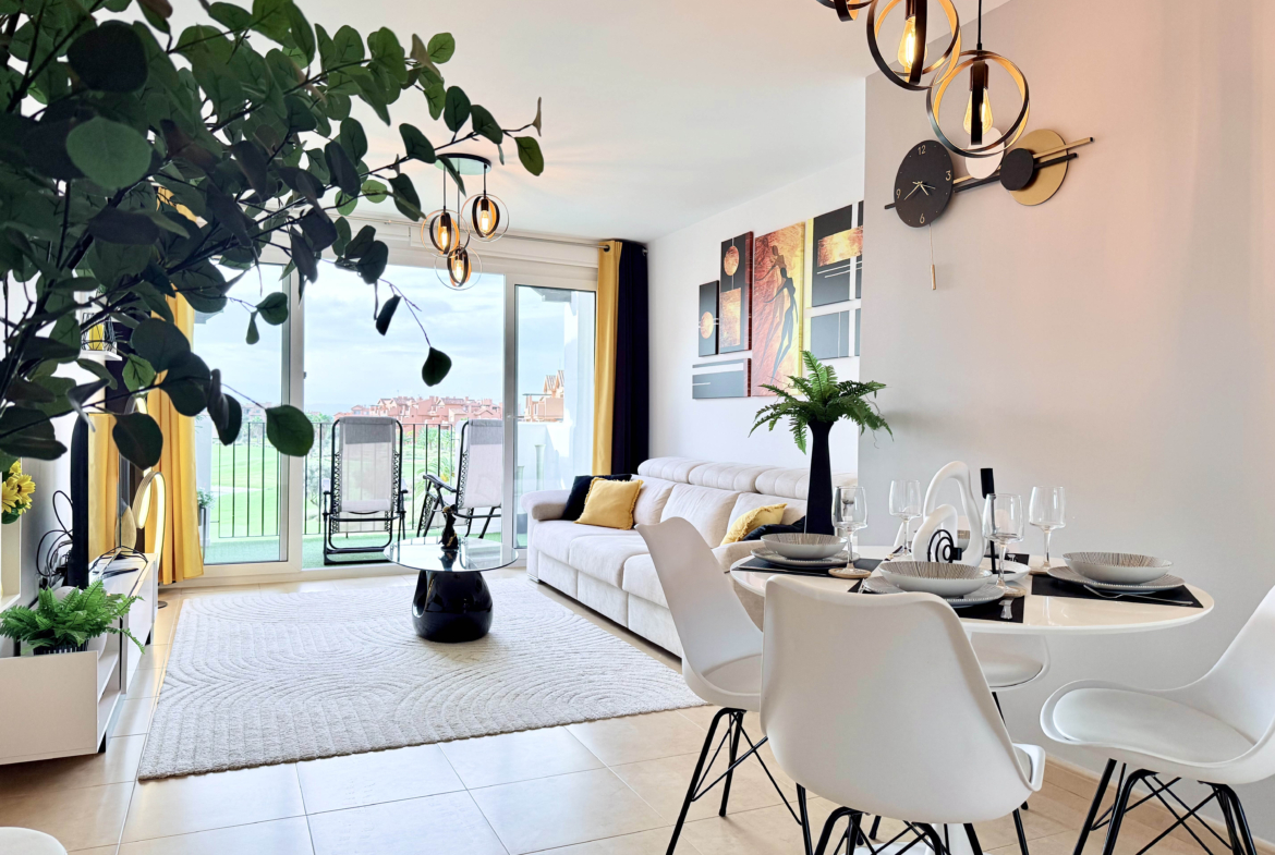 Contemporary living room in Mar Menor Golf Resort penthouse with terrace access