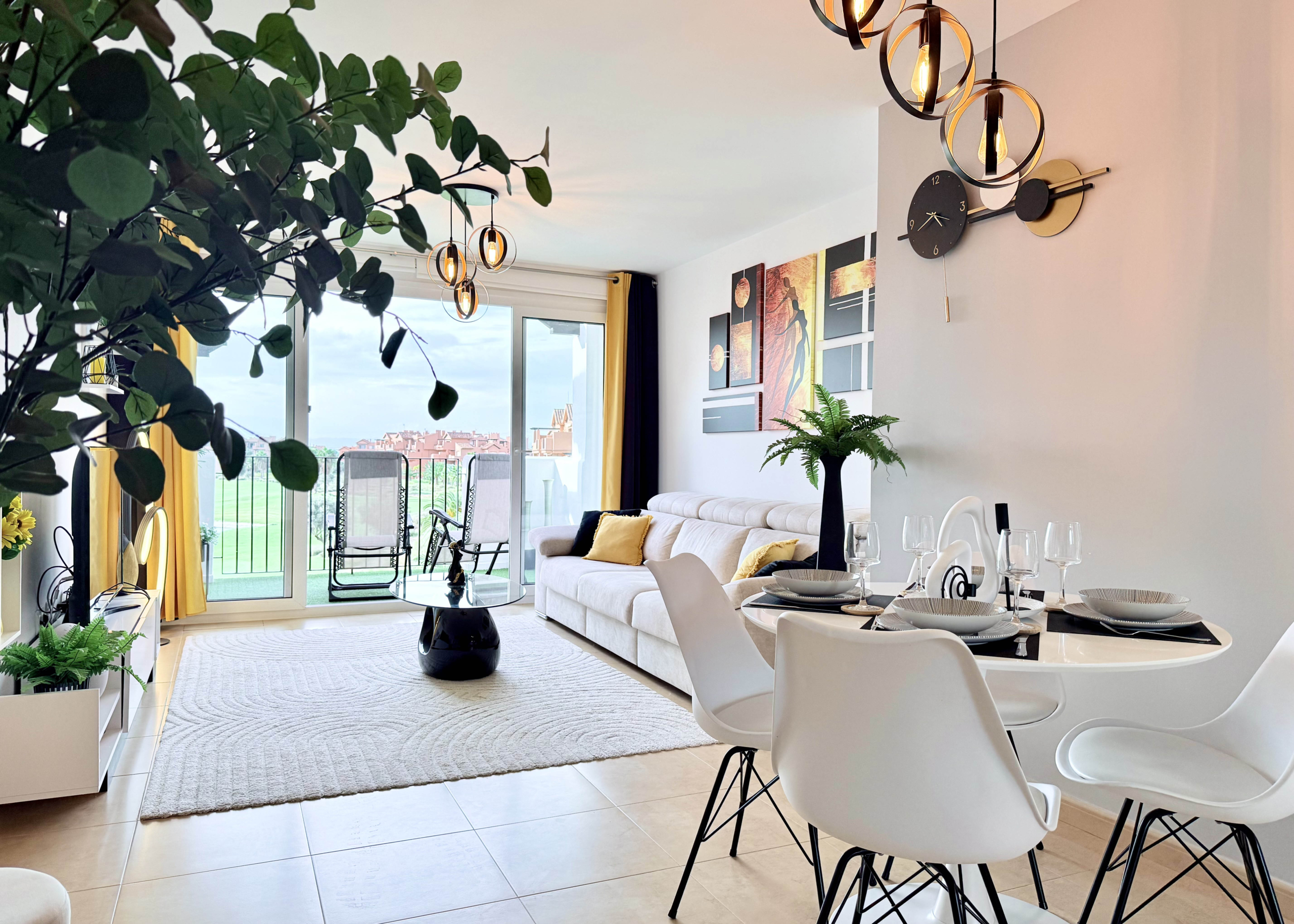 Contemporary living room in Mar Menor Golf Resort penthouse with terrace access