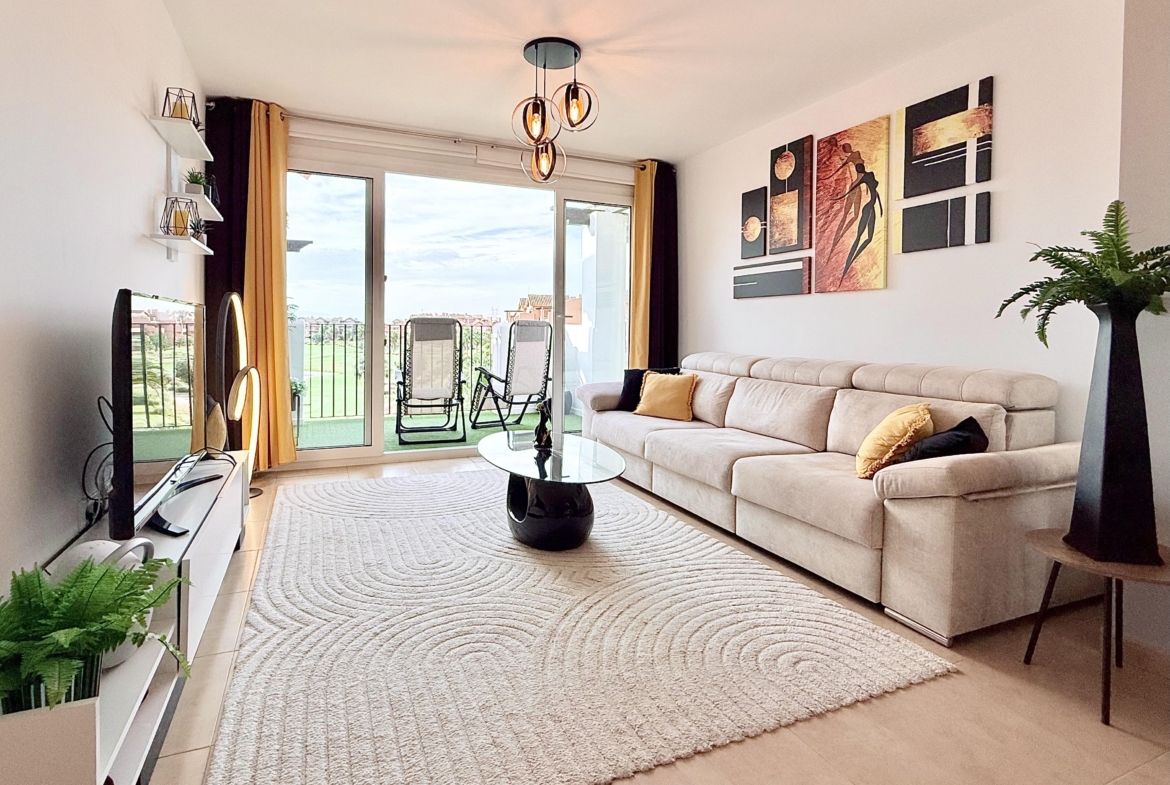 Contemporary living room in Mar Menor Golf Resort penthouse with terrace access