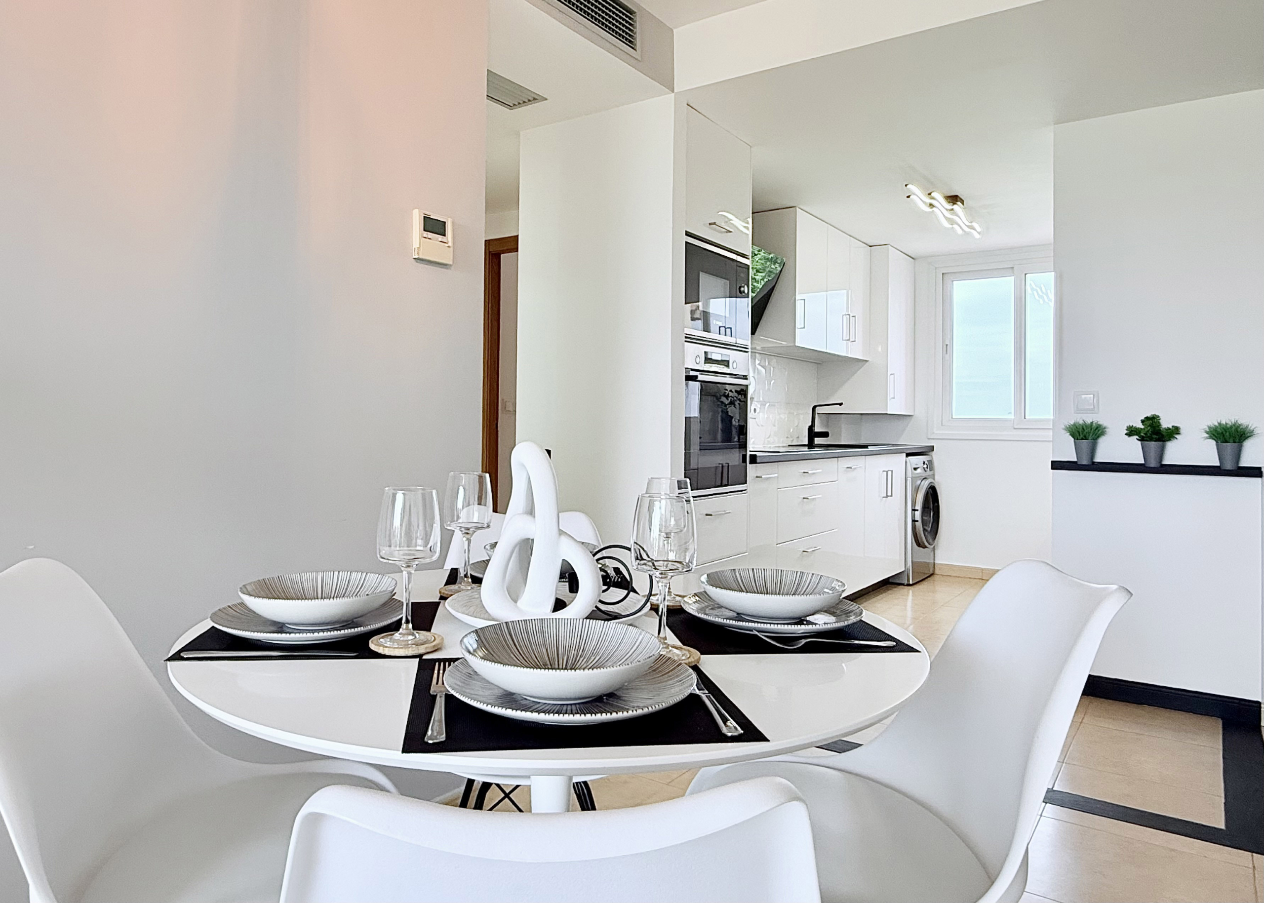 Contemporary living room in Mar Menor Golf Resort penthouse with terrace access