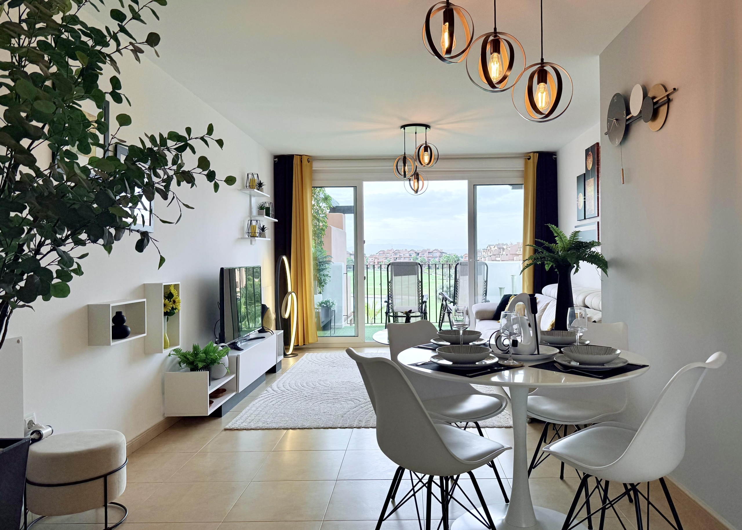 Contemporary living room in Mar Menor Golf Resort penthouse with terrace access