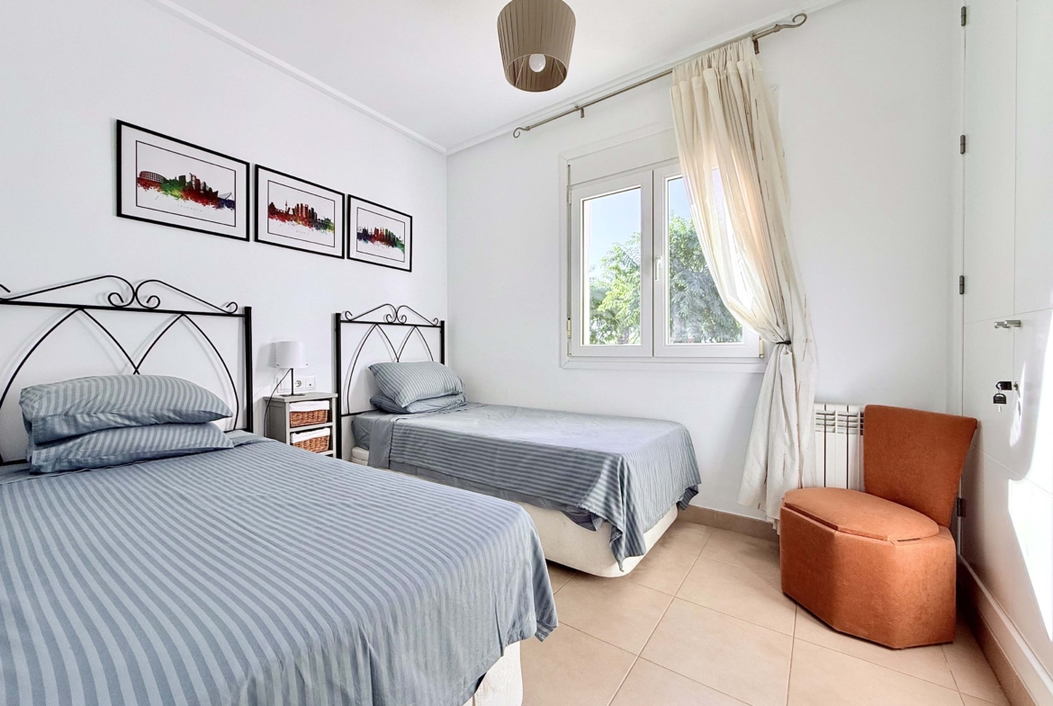 Spacious upstairs bedroom with built-in wardrobes at the Isla Grosa villa on Mar Menor Golf Resort