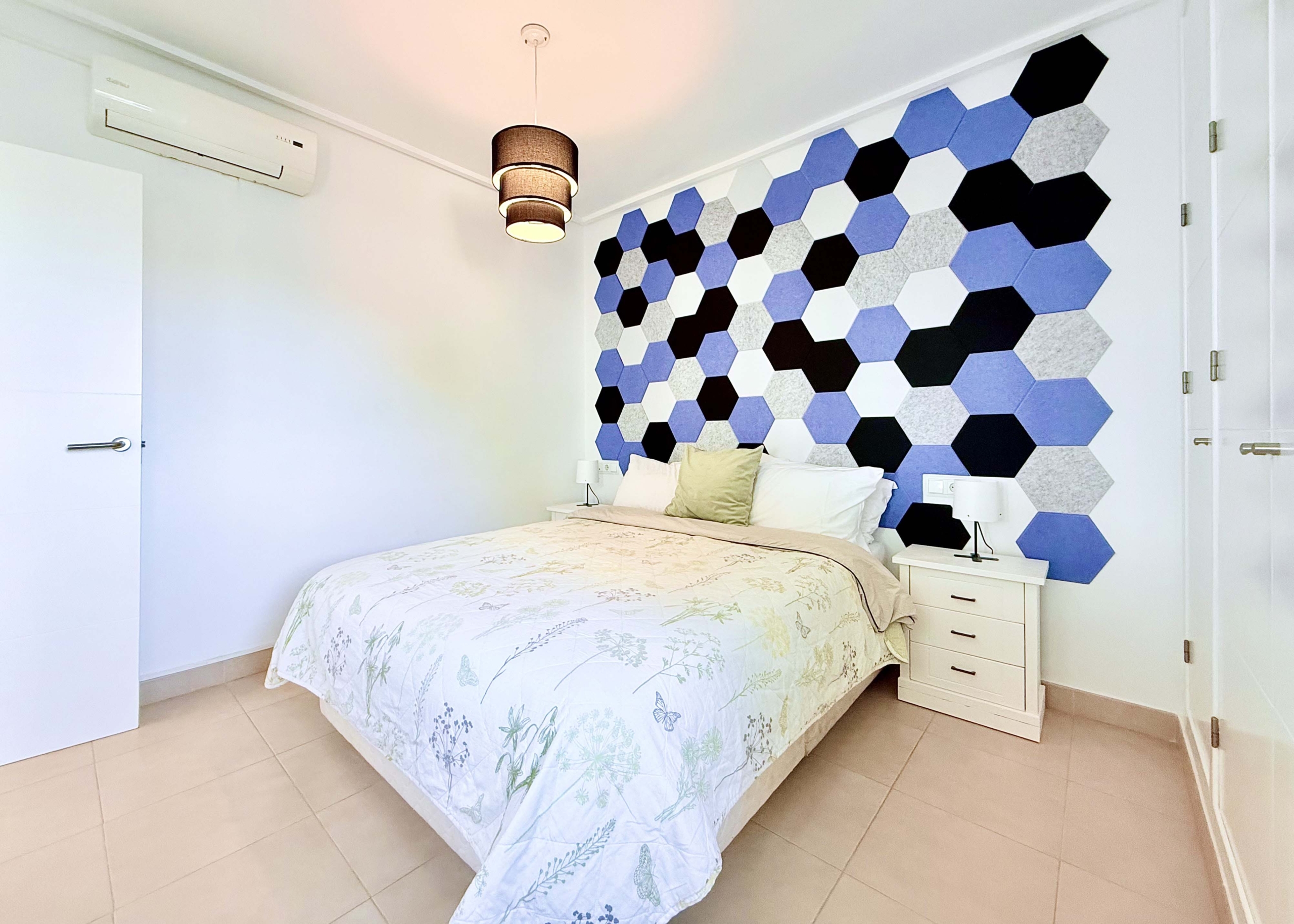 Spacious upstairs bedroom with built-in wardrobes at the Isla Grosa villa on Mar Menor Golf Resort.