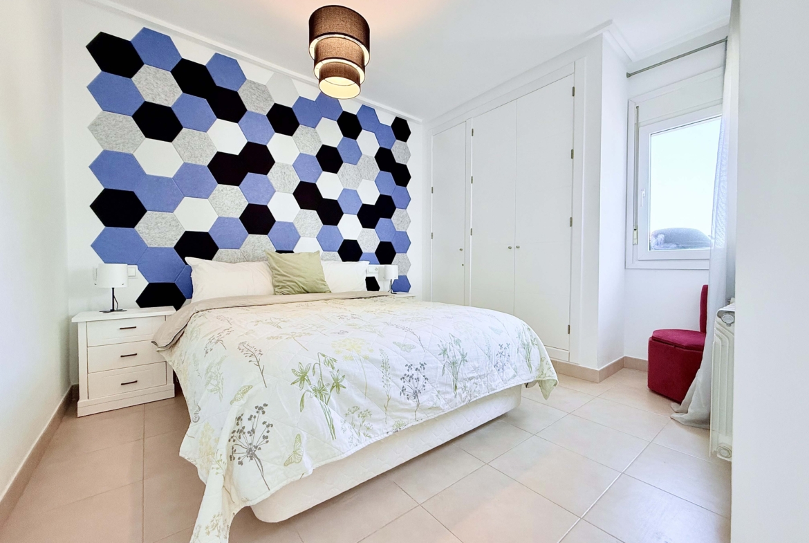 Spacious upstairs bedroom with built-in wardrobes at the Isla Grosa villa on Mar Menor Golf Resort.