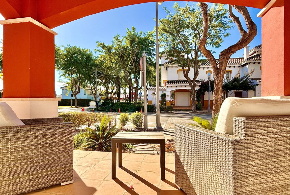 Front covered terrace with morning sun at the Isla Grosa villa on Mar Menor Golf Resort.