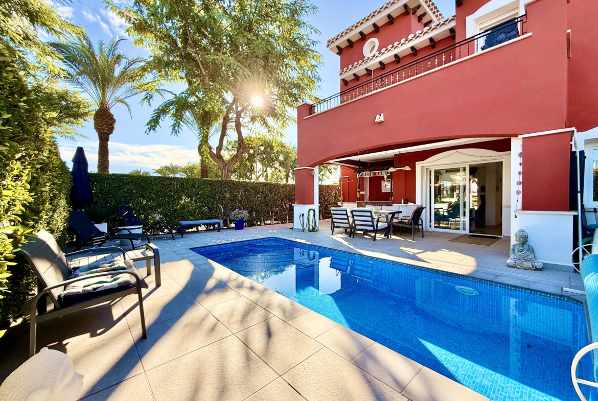 Heated private pool and modern tiled garden at the Isla Grosa villa on Mar Menor Golf Resort.