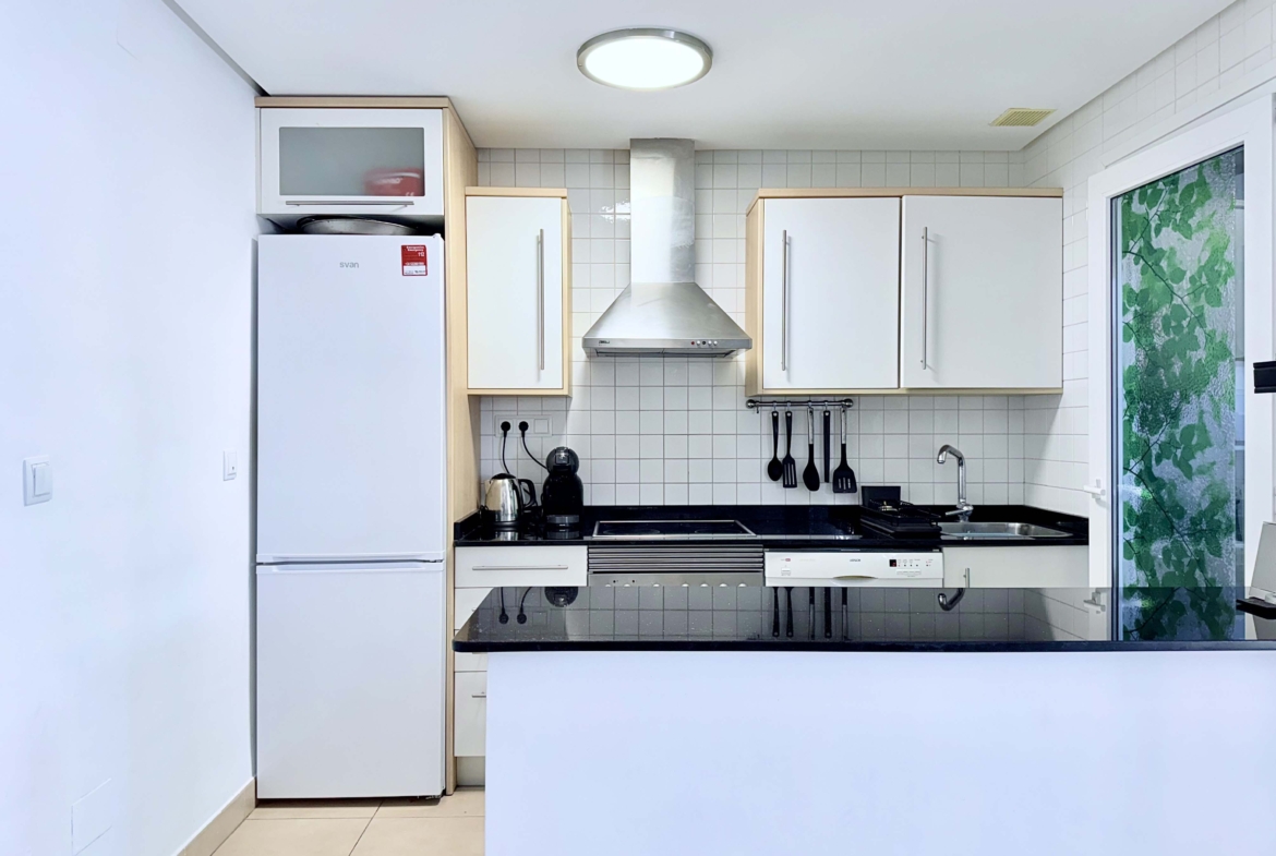 Updated kitchen with new worktops and utility room at the Isla Grosa villa on Mar Menor Golf Resort.