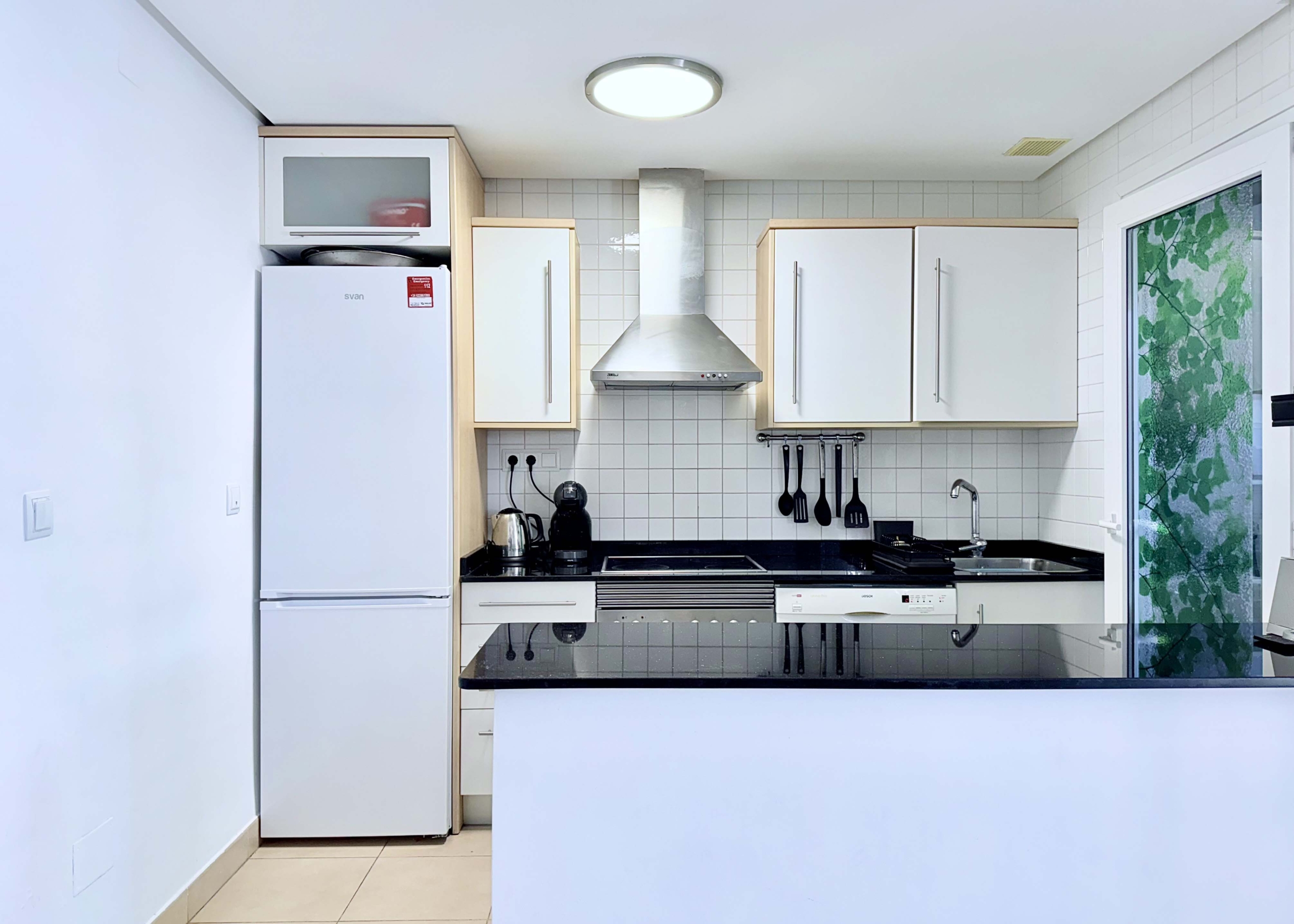 Updated kitchen with new worktops and utility room at the Isla Grosa villa on Mar Menor Golf Resort.