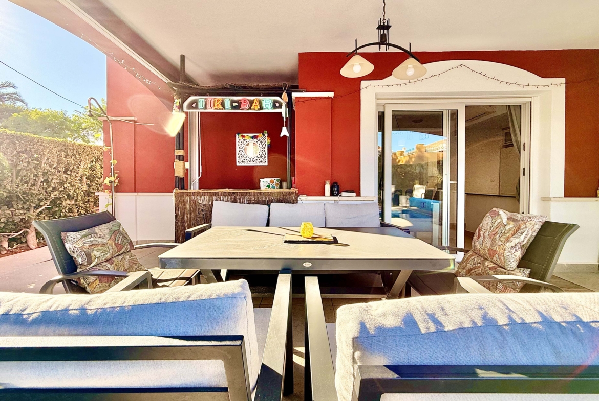 Rear covered terrace offering shaded afternoon space at the Isla Grosa villa on Mar Menor Golf Resort.