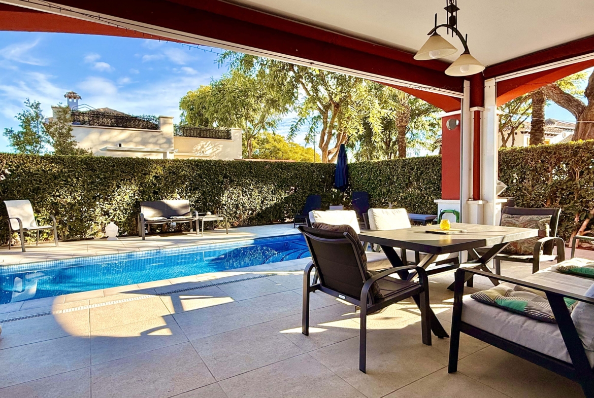 Rear covered terrace offering shaded afternoon space at the Isla Grosa villa on Mar Menor Golf Resort.