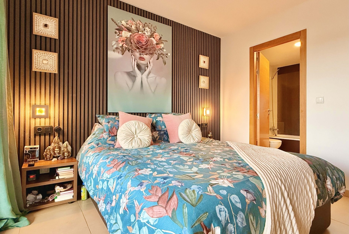 2-Bed Elegant Apartment master bedroom with terrace access and lake views at Mar Menor Golf Resort, offered by Levante Properties.