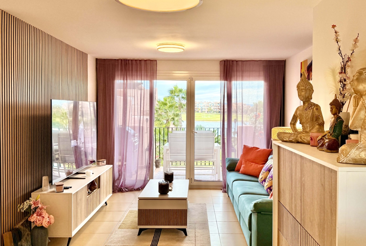2-Bed Elegant Apartment bright open-plan living room with terrace access in a Levante Properties listing at Mar Menor Golf Resort.