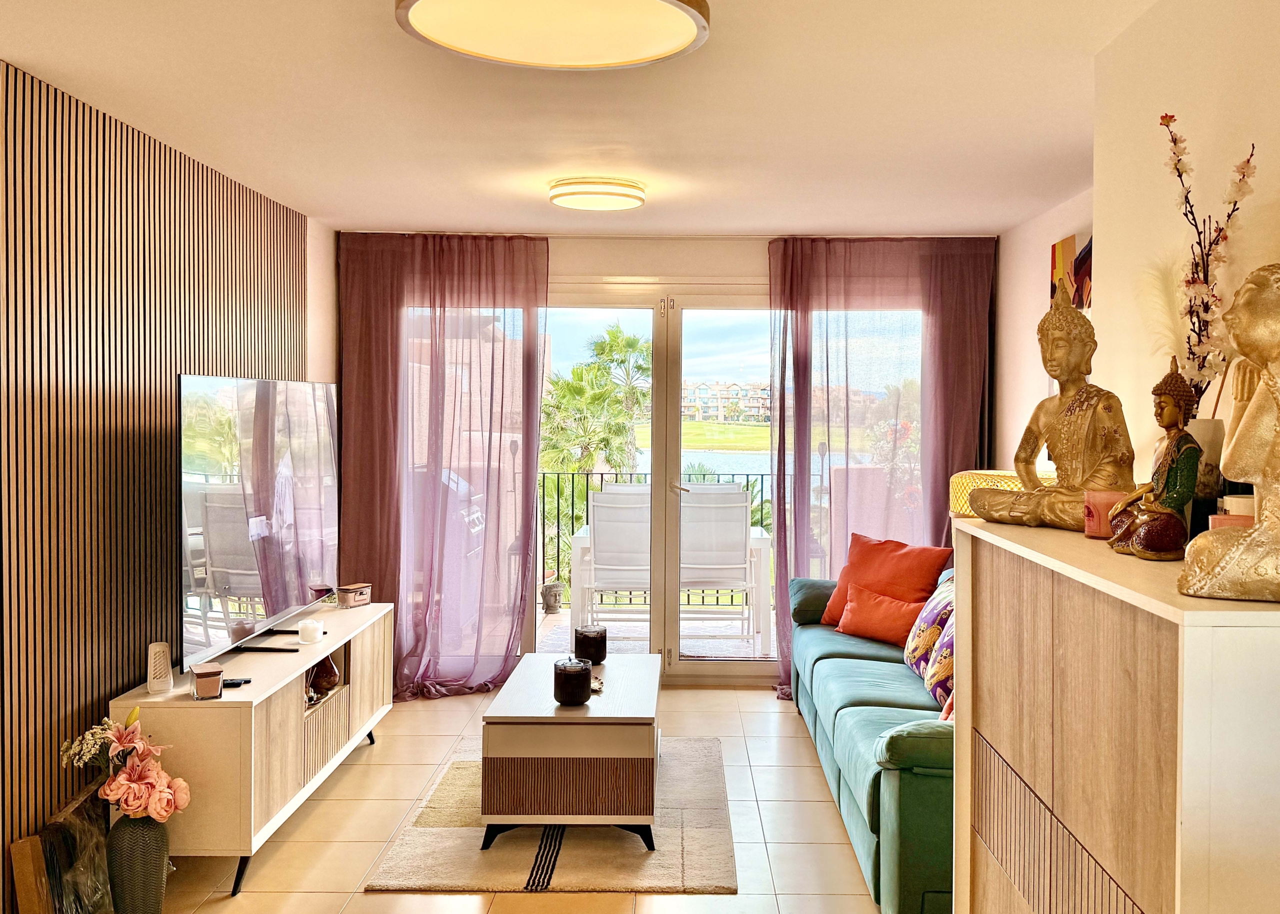 2-Bed Elegant Apartment bright open-plan living room with terrace access in a Levante Properties listing at Mar Menor Golf Resort.