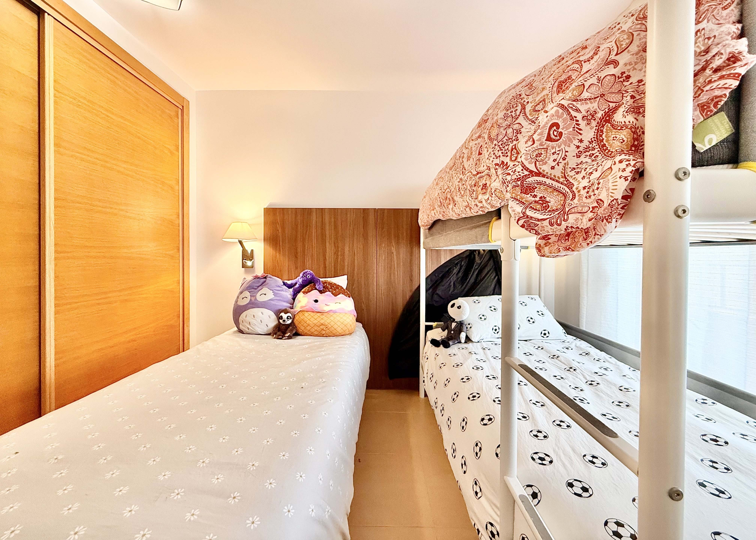 2-Bed Elegant Apartment second bedroom with private terrace and resort views at Mar Menor Golf Resort, Levante Properties listing.