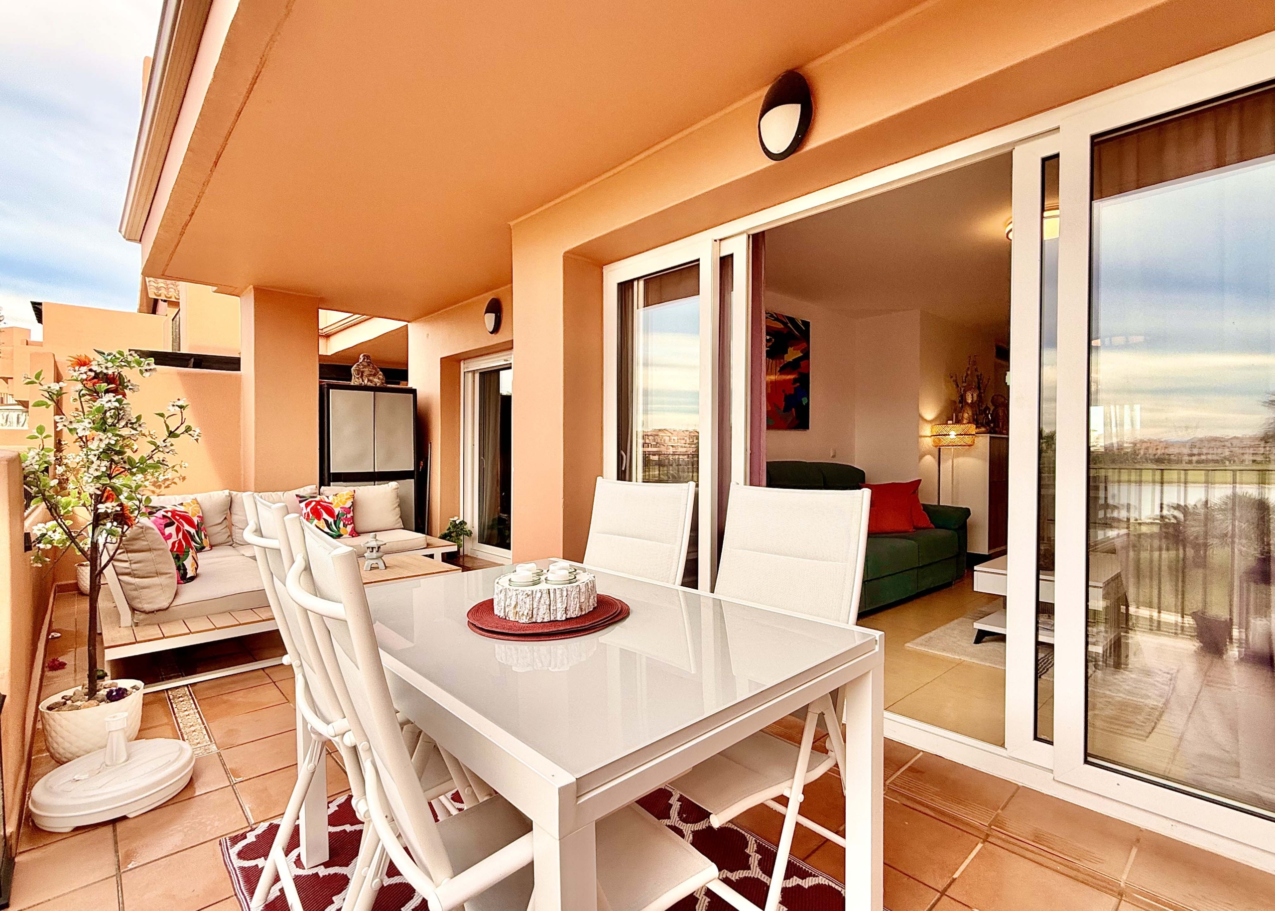 2-Bed Elegant Apartment terrace with stunning lake, golf and pool views at Mar Menor Golf Resort, listed by Levante Properties.