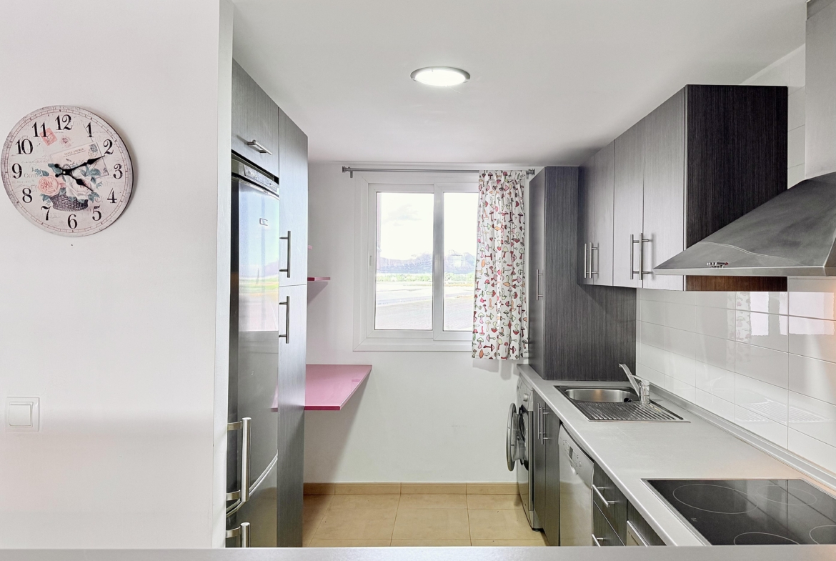 Modern kitchen in a 2-Bed South Facing Apartment at Mar Menor Golf Resort by Levante Properties