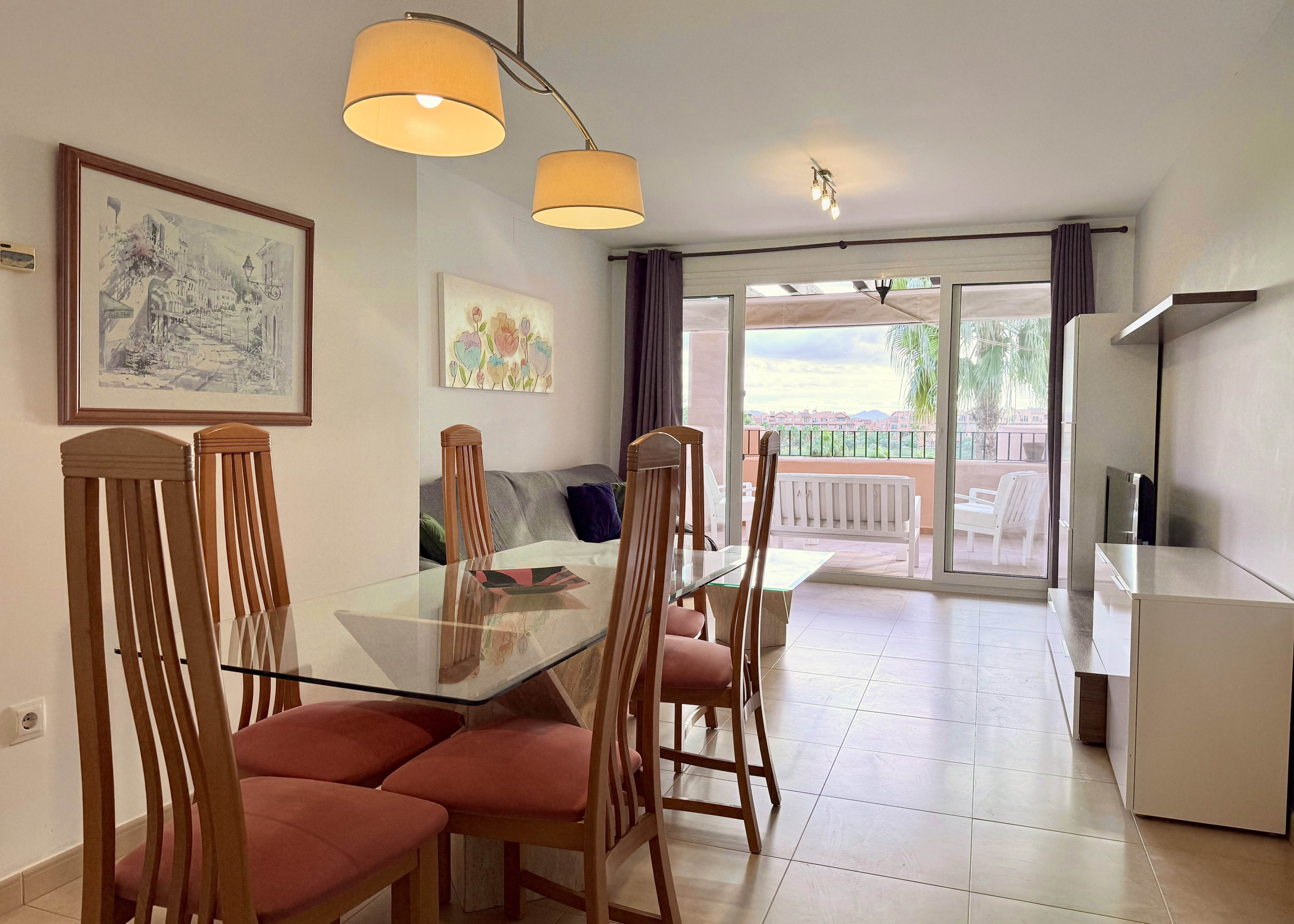 Open-plan living and dining area in a 2-Bed South Facing Apartment at Mar Menor Golf Resort by Levante Properties