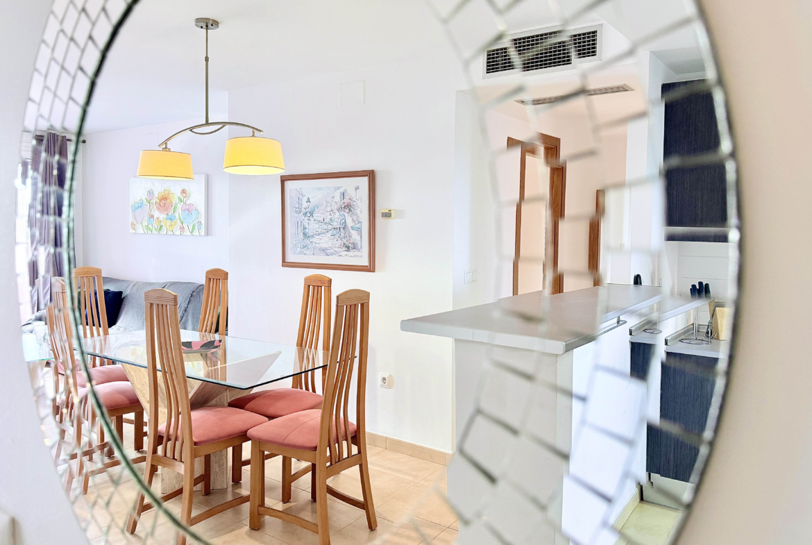 Open-plan living and dining area in a 2-Bed South Facing Apartment at Mar Menor Golf Resort by Levante Properties