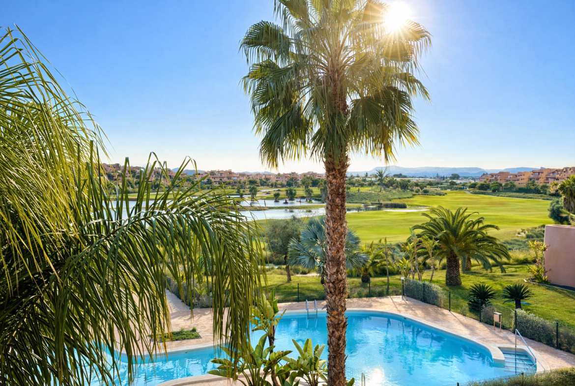 Communal pool and golf views from a 2-Bed South Facing Apartment at Mar Menor Golf Resort by Levante Properties