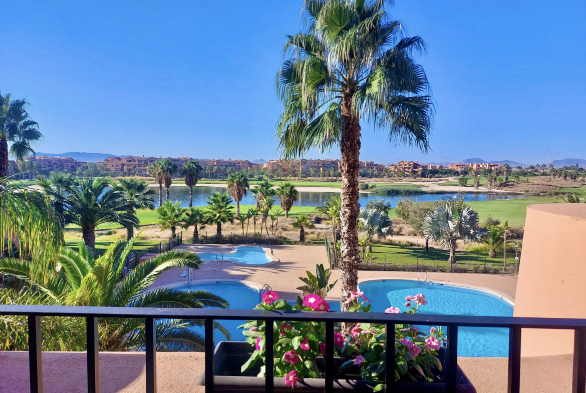 Communal pool and golf views from a 2-Bed South Facing Apartment at Mar Menor Golf Resort by Levante Properties