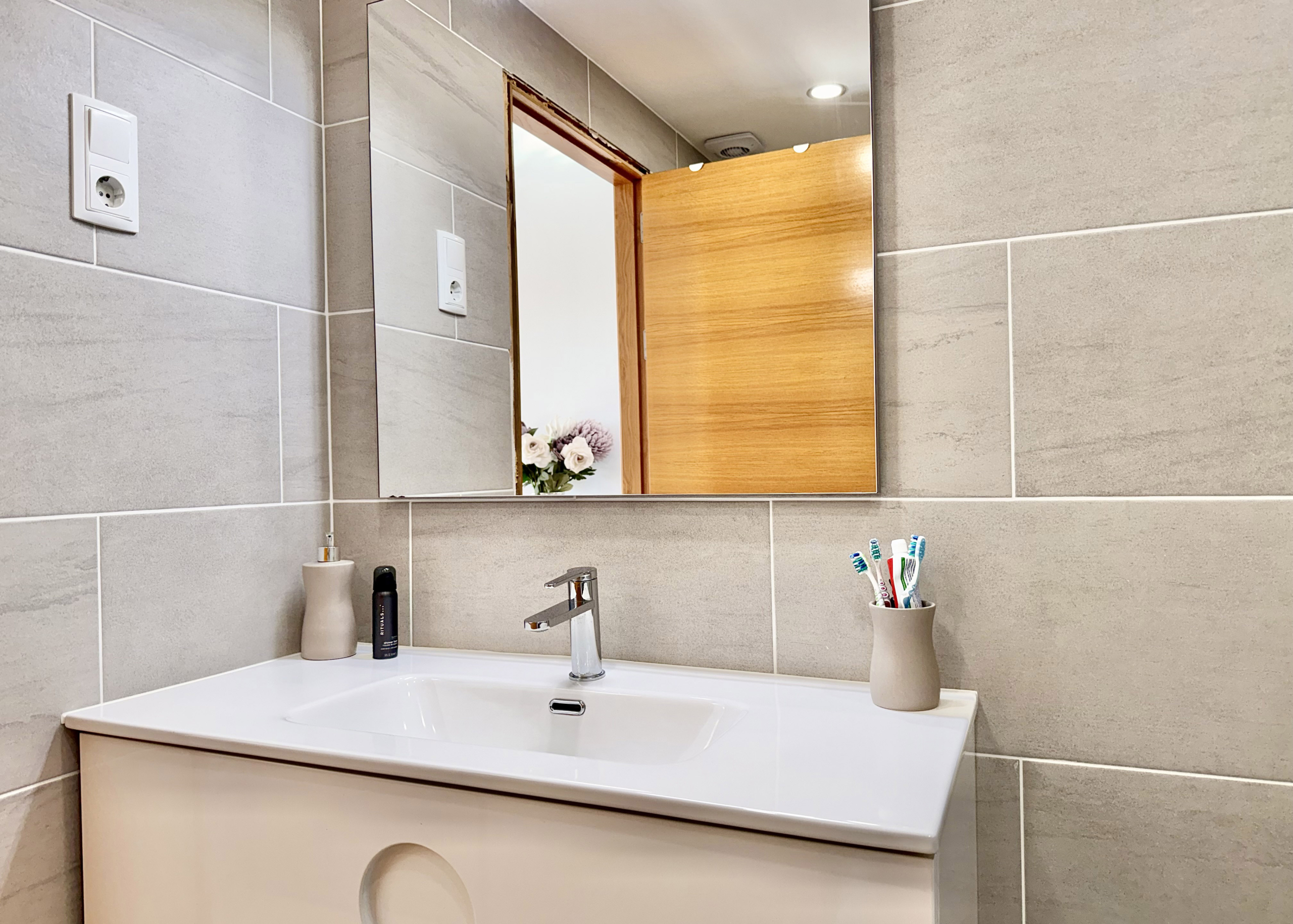 Modern en-suite bathroom with walk-in shower at Mar Menor Golf Resort apartment by Levante Properties