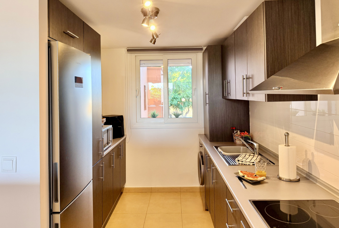 Open plan kitchen in Mar Menor Golf Resort apartment by Levante Properties