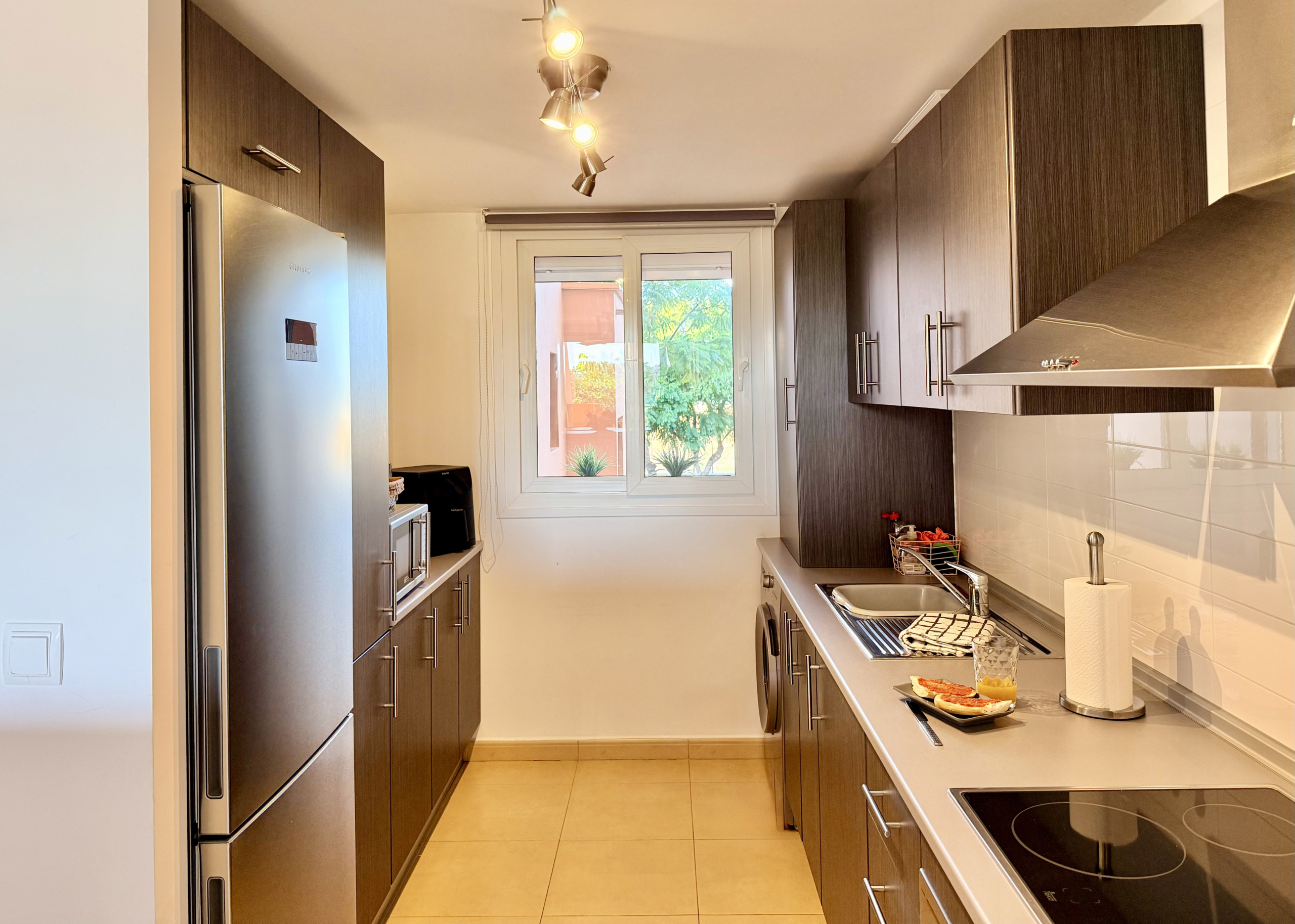 Open plan kitchen in Mar Menor Golf Resort apartment by Levante Properties