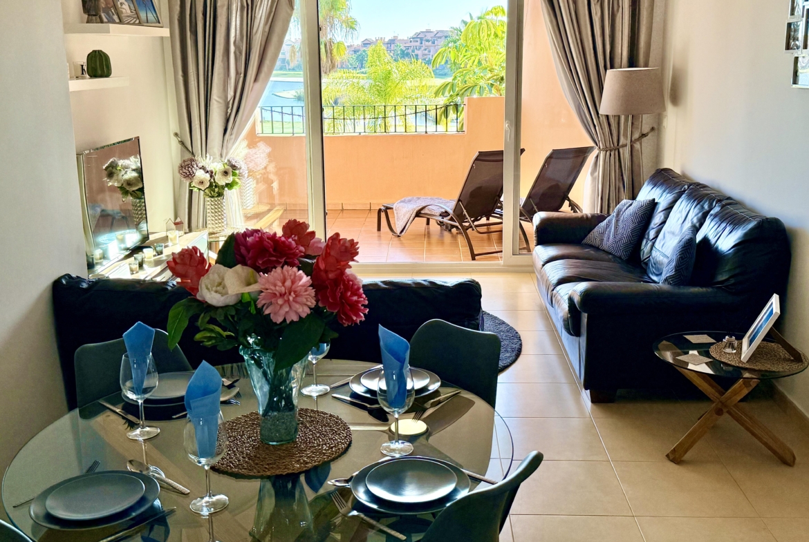 Open plan living and dining area in Mar Menor Golf Resort apartment by Levante Properties